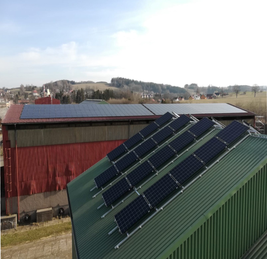 Local farm animals are happy to use the green power generated by the new 156 kWp solar power plant.